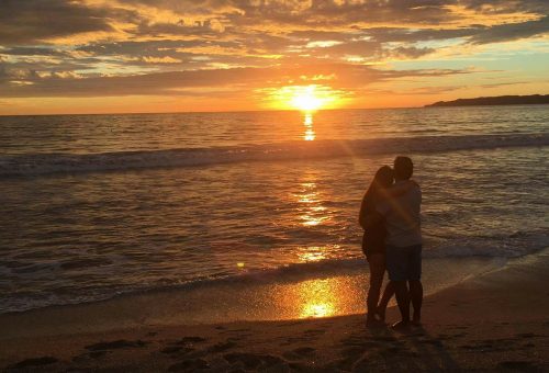 Trip Achiever Jennifer Ky with her Husband Enjoying the Sunset